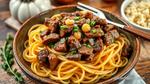 Sautéed Beef with Onions and Noodles