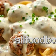 Bake Beef Meatballs in Creamy Alfredo Sauce