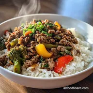 Spicy Ground Beef StirFry Bowl with Garlic Veggies and Steamy Rice in 20 Minutes