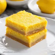 Zesty Lemon Dream Bars Sunshine on a Plate