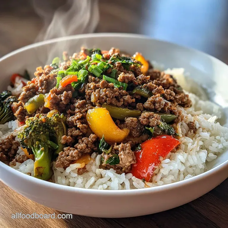 Spicy Ground Beef StirFry Bowl with Garlic Veggies and Steamy Rice